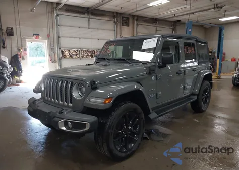 2021 Jeep Wrangler 4Xe Unlimited Sahara 4X4 z USA, uszkodzony, nr VIN 1C4JJXP6XMW682683